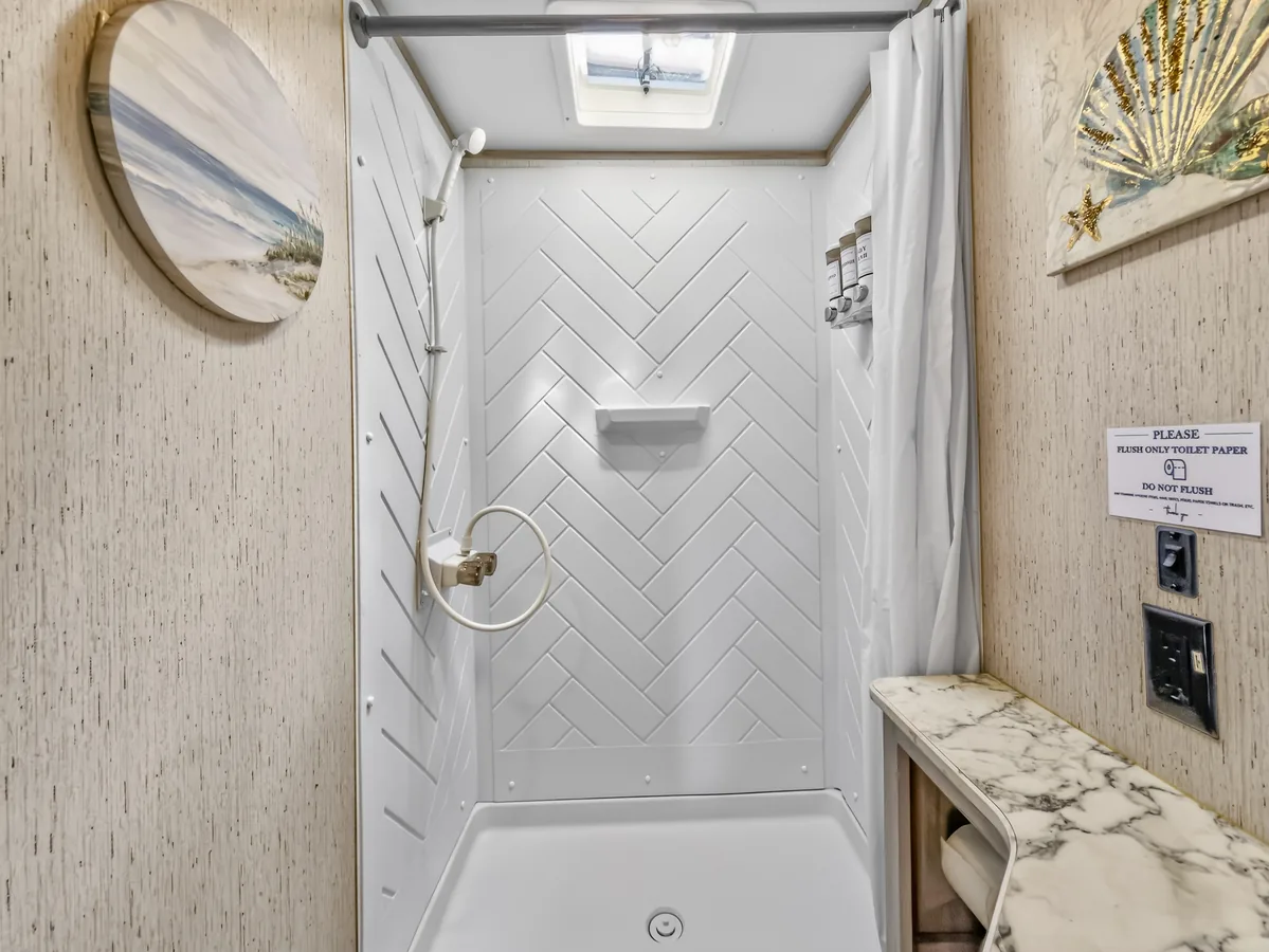 Bright RV shower and bathroom